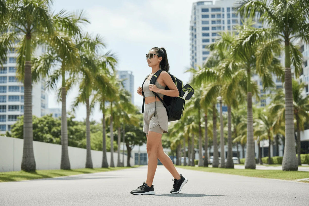Lady wearing Non Polarised Sunglasses Carrying Pickleball Bag
